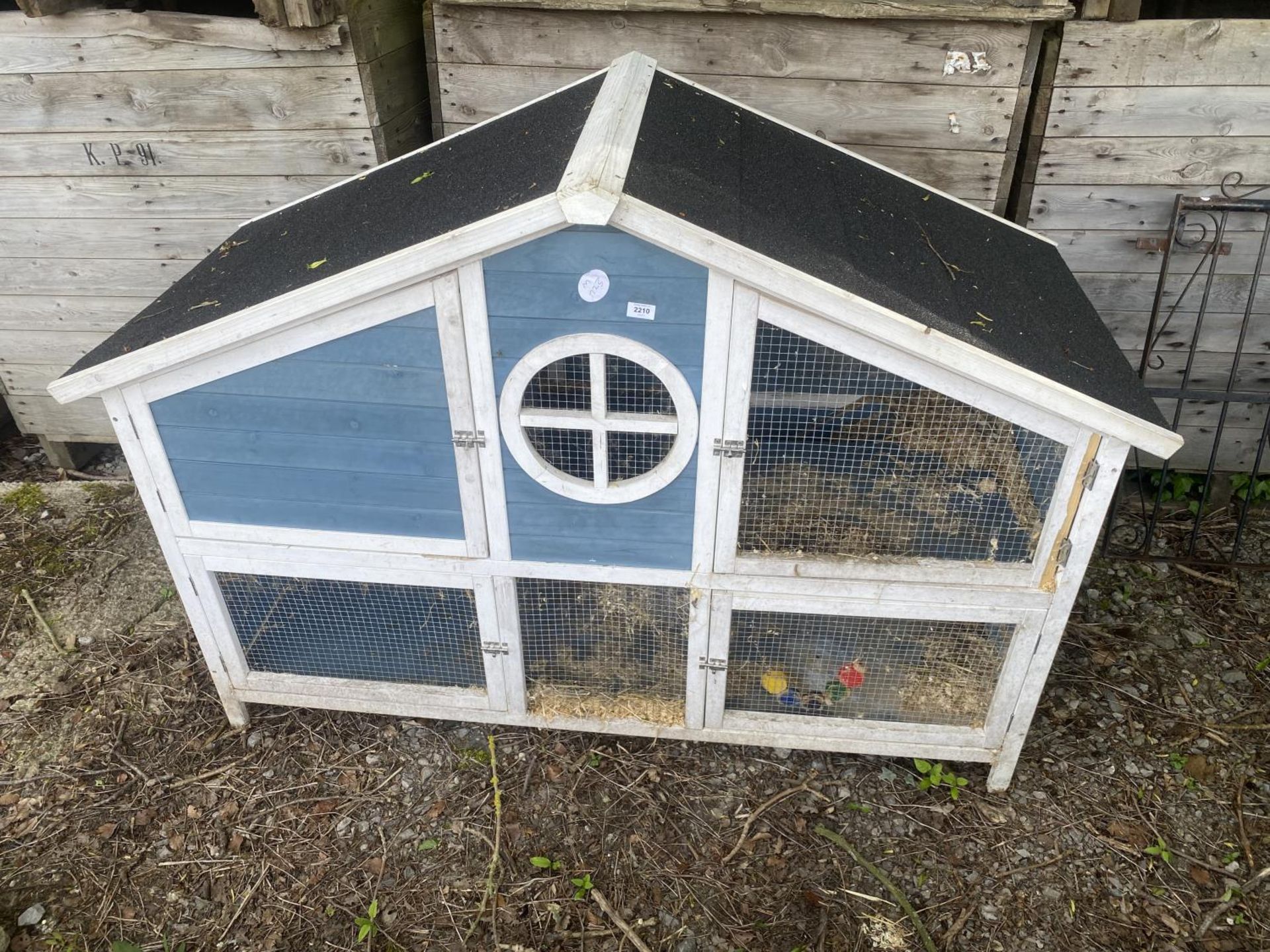 A WOODEN RABBIT HUTCH