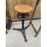 AN INDUSTRIAL ADJUSTABLE STOOL WITH CAST BASE