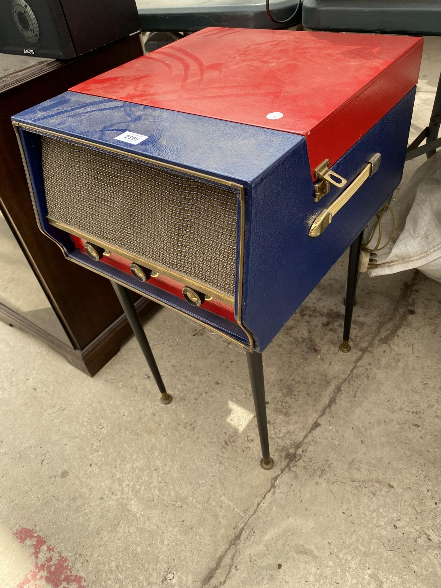 A DANETTE MONARCH RECORD PLAYER ON DANSETTE LEGS