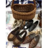 A COLLECTION OF VINTAGE CHILDREN'S SHOES TO INCLUDE CLOGS, ETC PLUS A BASKET