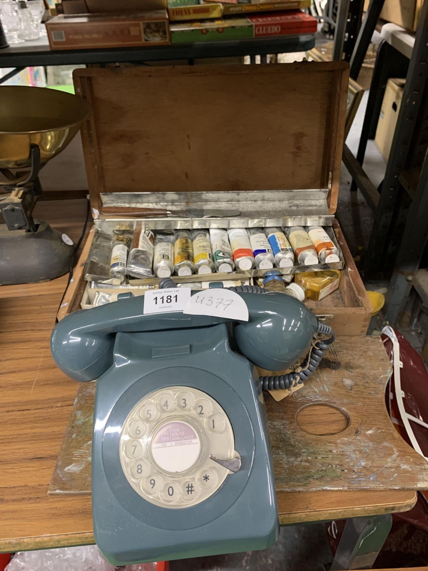 A VINTAGE DIAL UP TELEPHONE AND ARTISTS PAINT BOX