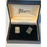 A PAIR OF RENNIE MACKINTOSCH STYLE CUFFLINKS IN A PRESENTATION BOX