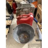 TWO VINTAGE PETROL JERRY CANS AND A GALVANISED BUCKET