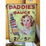 A LARGE 'DADDIES FAVOURITE SAUCE' METAL SIGN 50CM X 70CM