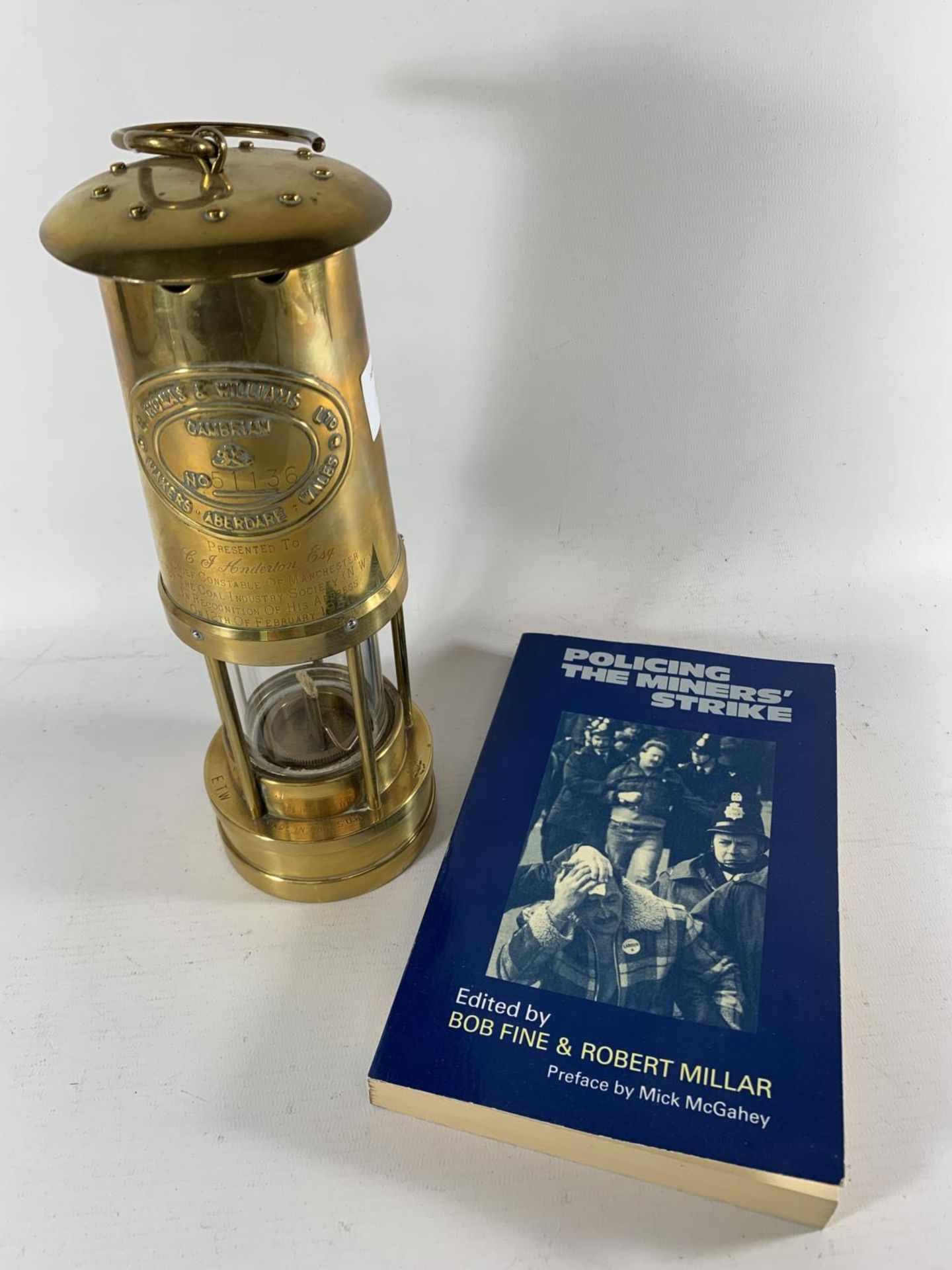 * A BRASS PRESENTATION MINERS LAMP FROM THE COAL INDUSTRY SOCIETY (NW) 1981, HEIGHT 27CM AND A
