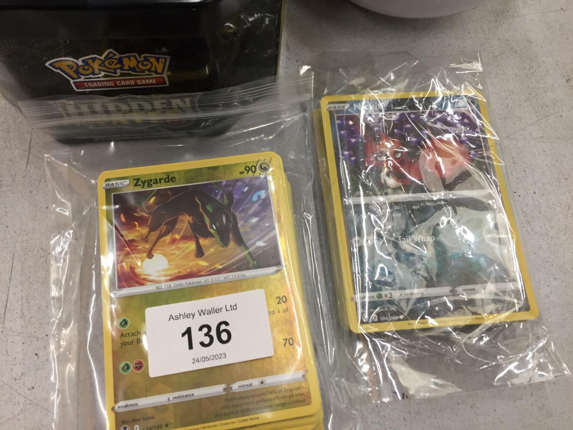 TWO POKEMON TINS WITH 100+ CARDS TO INCLUDE HOLO'S, RARES, ETC - Image 2 of 3