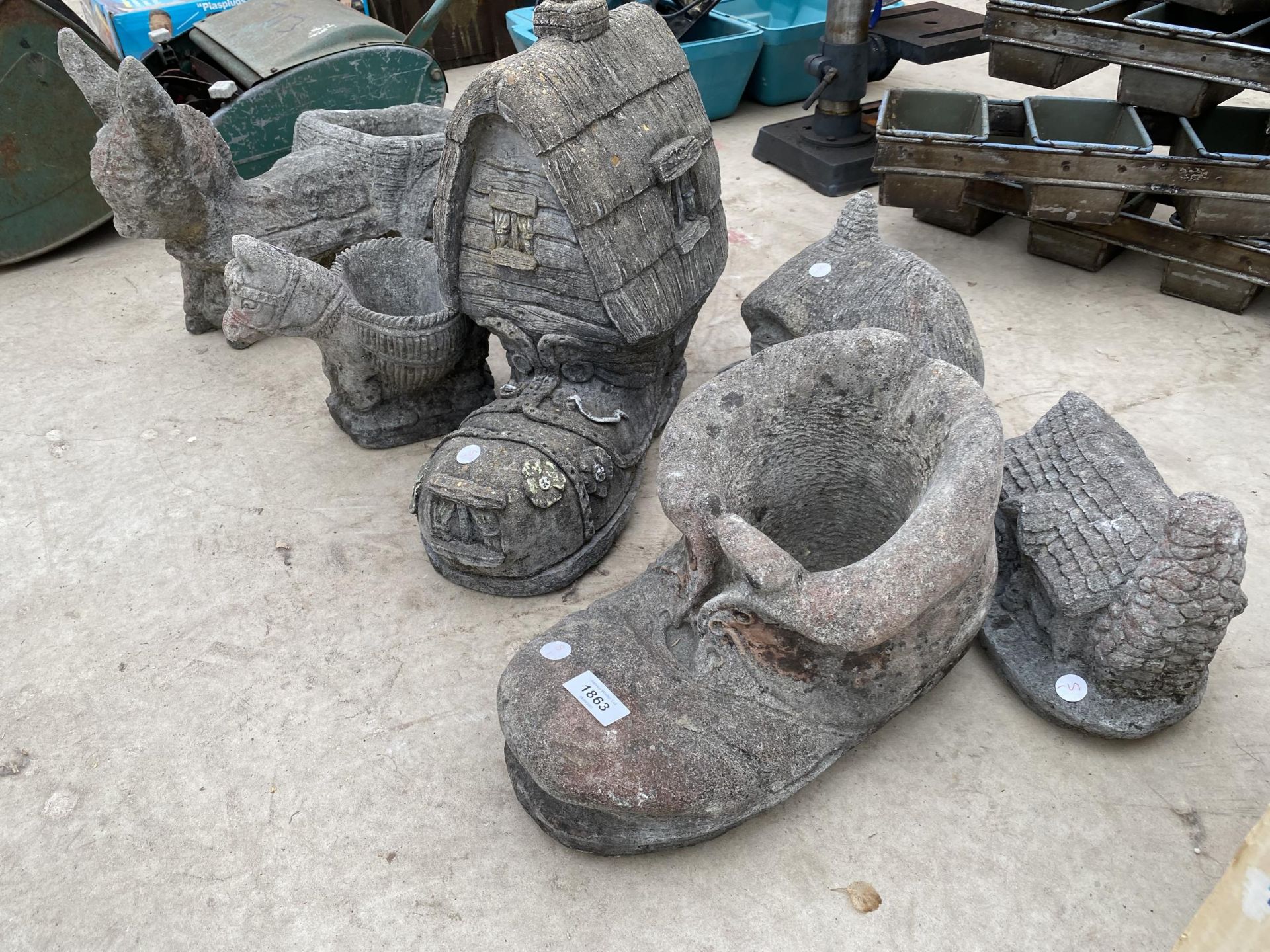 AN ASSORTMENT OF RECONSTITUTED STONE GARDEN ORNAMENTS TO INCLUDE BOOTS, COTTAGES AND PLANTERS ETC - Image 2 of 3