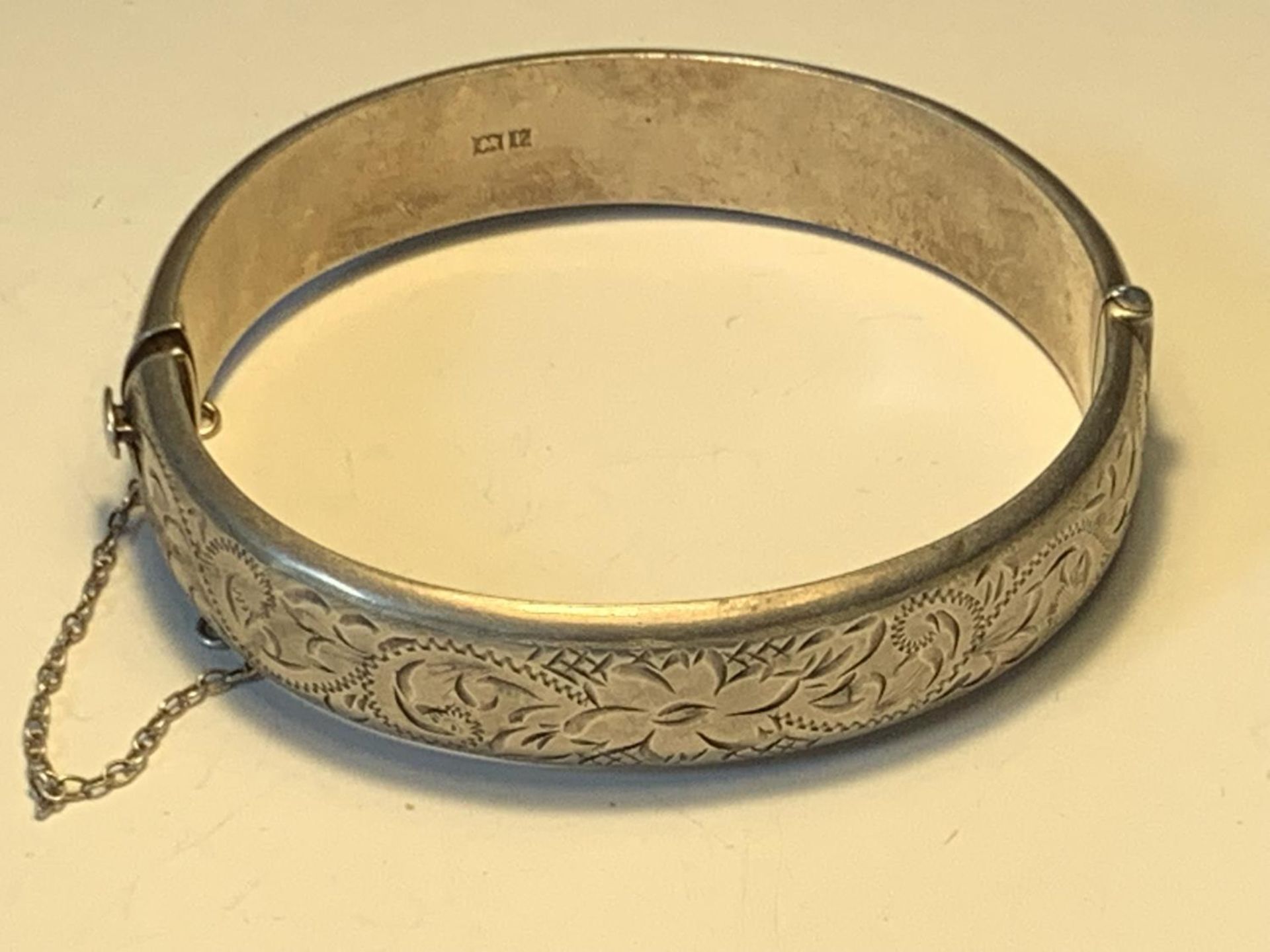 A HALLMARKED BIRMINGHAM SILVER BANGLE