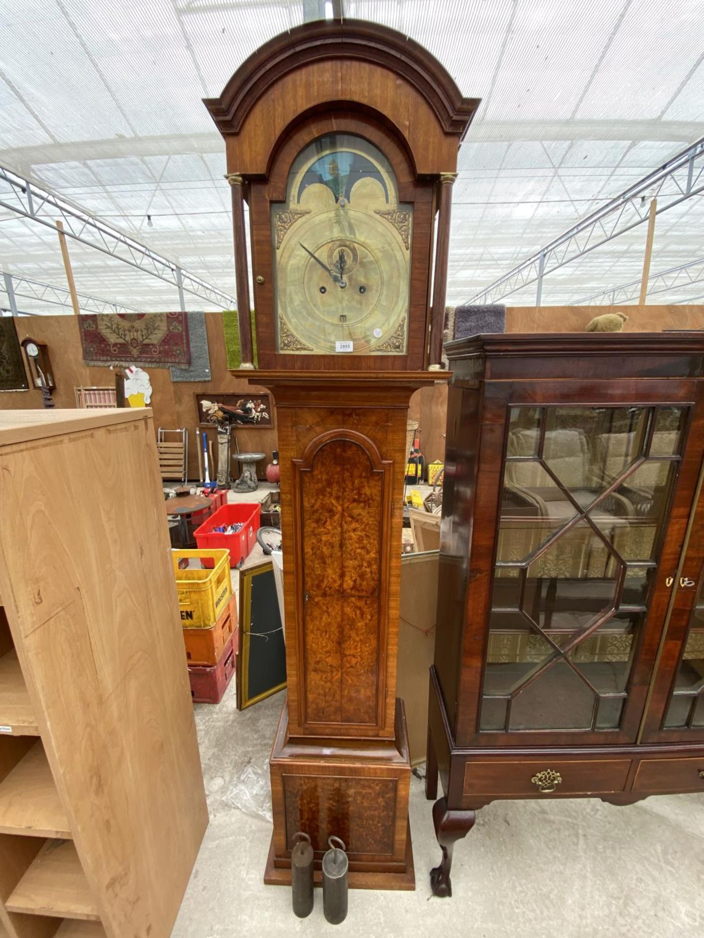 AN EIGHT-DAY BRASS FACED ROLLING MOON LONGCASE CLOCK MOVEMENT, IN LATER CASE