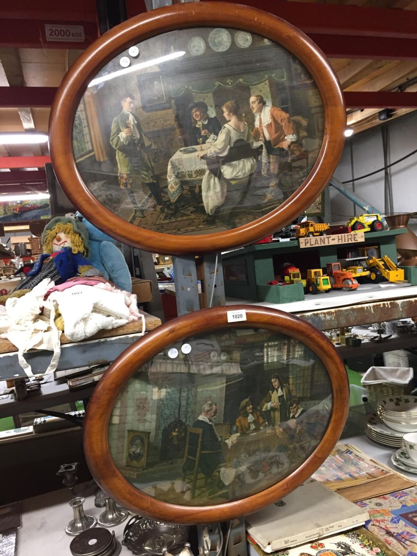 A PAIR OF OVAL PRINTS IN MAHOGANY FRAMES WITH CONVEX GLASS DIAMETER 59CM