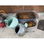 FOUR METAL TROUGH PLANTERS, A GALVANISED WATERING CAN AND A PAINTED METAL WATERING CAN