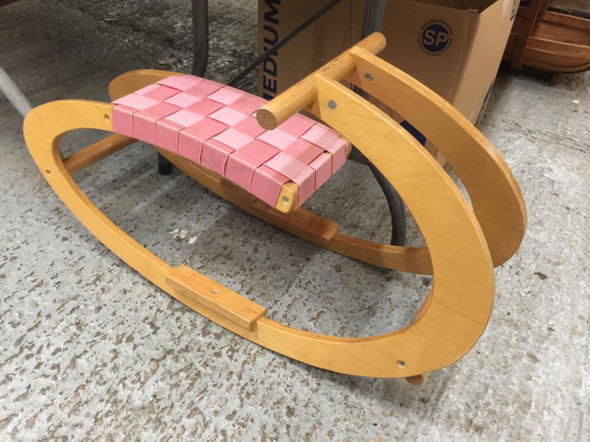 A 'SIRCH' WOODEN CHILD'S ROCKER