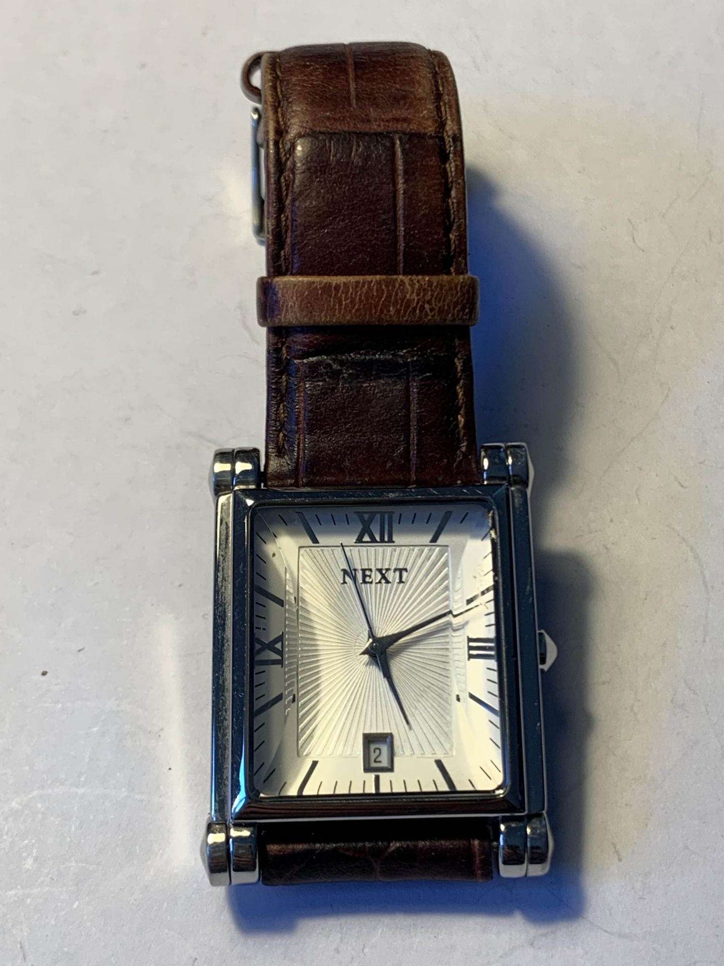 A NEXT WRISTWATCH SEEN WORKING BUT NO WARRANTY