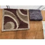 TWO MODERN RUGS TO INCLUDE A CREAM AND BROWN PATTERNED RUG
