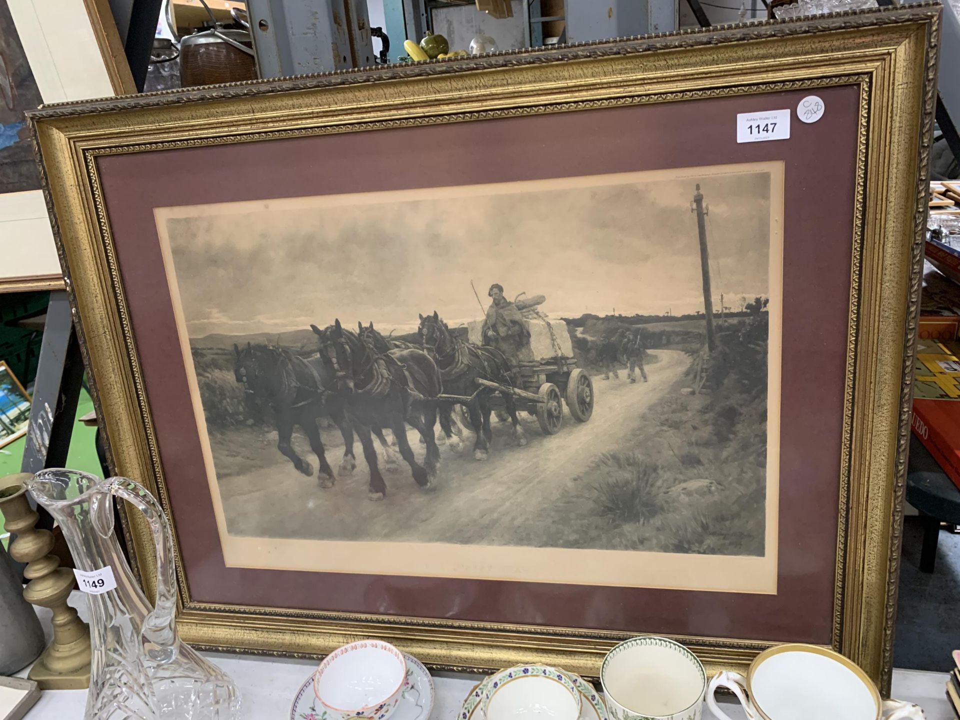 A LARGE GILT FRAMED PRINT TITLED 'THE QUARRY TEAM'