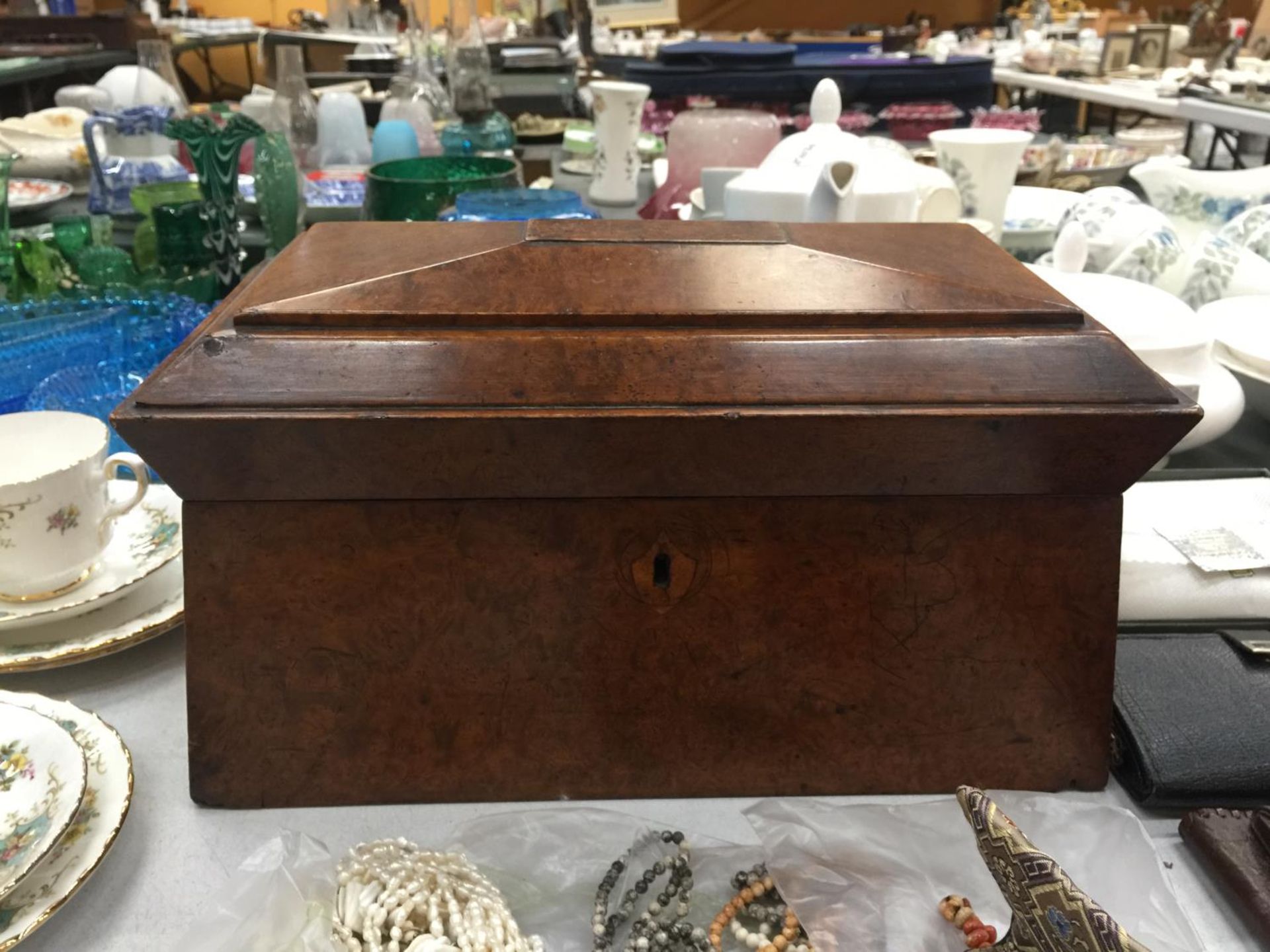 A VICTORIAN BURR MAPLE TEA CADDY, 35 X 18CM