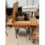 A SINGER TREADLE SEWING MACHINE