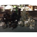 A LARGE QUANTITY OF VINTAGE PERFUME BOTTLES PLUS VASES, LIDDED POTS, TRINKETS, ETC