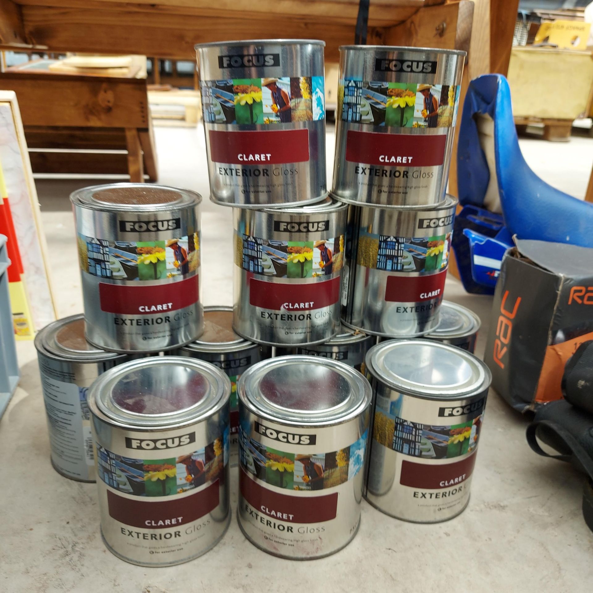 TWELVE TINS OF FOCUS EXTERIOR PAINT