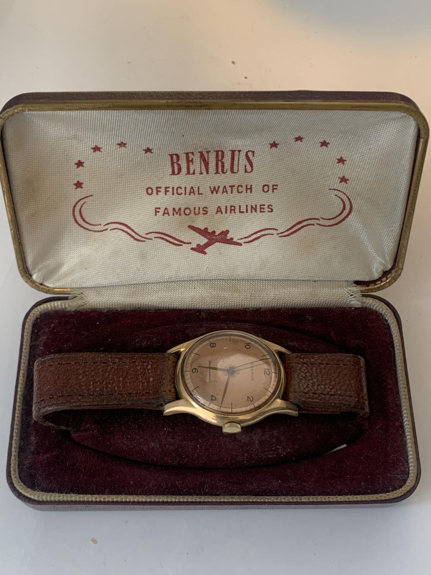 A VINTAGE BENRUS WRISTWATCH IN ORIGINAL BOX SAYING OFFICIAL WATCH OF THE FAMOUS AIRLINES