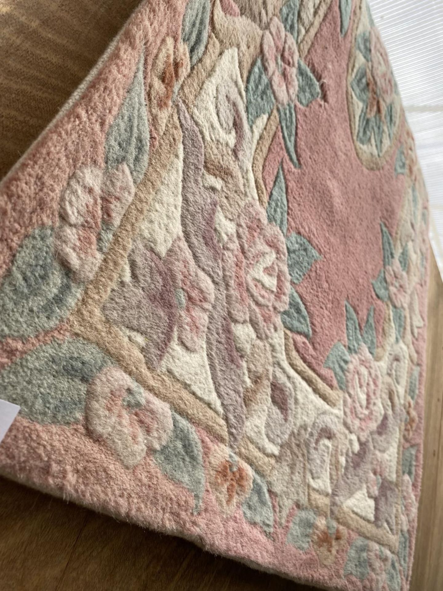 A SMALL PINK PATTERNED RUG - Image 2 of 2