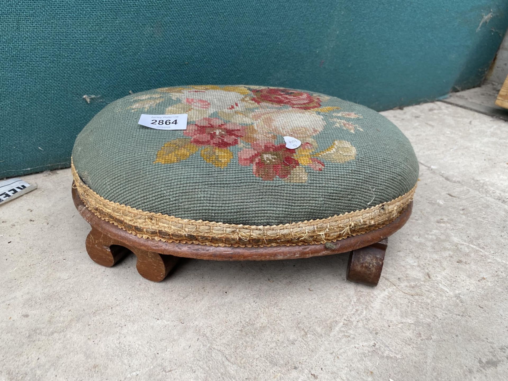 AN OVAL STOOL WITH WOOLWORK TOP, 13X10"