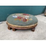 AN OVAL STOOL WITH WOOLWORK TOP, 13X10"