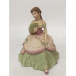 A COALPORT FIGURINE "INTERLUDE" FROM THE AGE OF ELEGANCE COLLECTION 1991 WITH A MATT FINISH - 17 CM