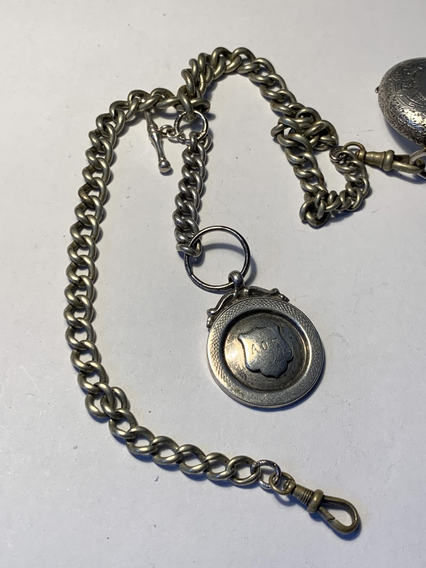 A POCKET WATCH ON A CHAIN WITH A HALLMARKED BIRMINGHAM SILVER FOB - Image 6 of 6