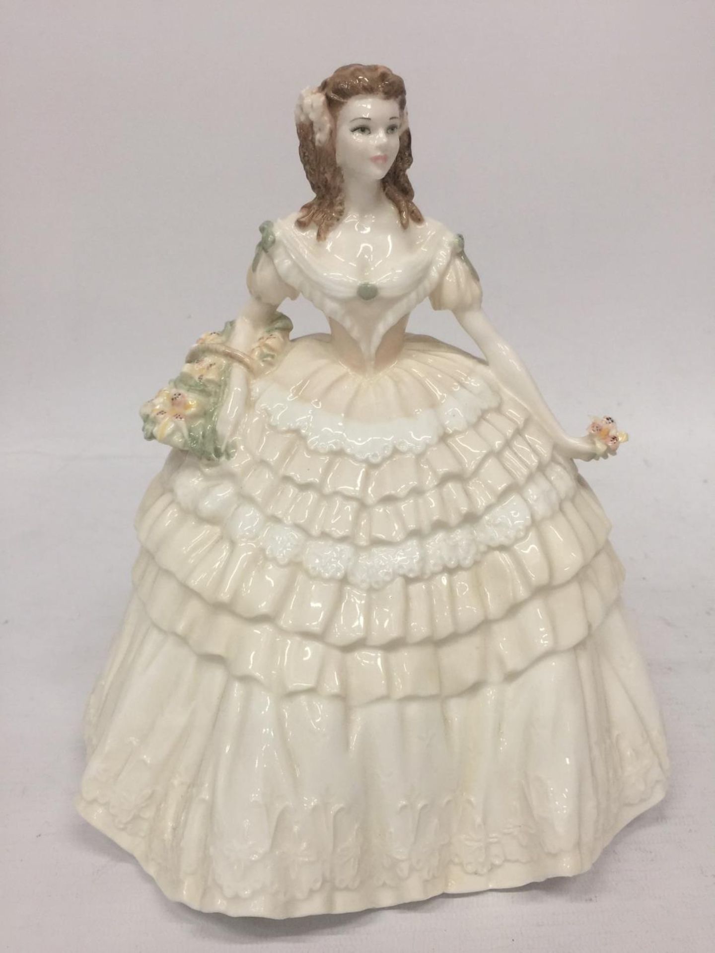 A STUNNING COALPORT FIGURINE FROM "THE FOUR FLOWERS COLLECTION" SCULPTED BY JACK GLYUNN AND BEING