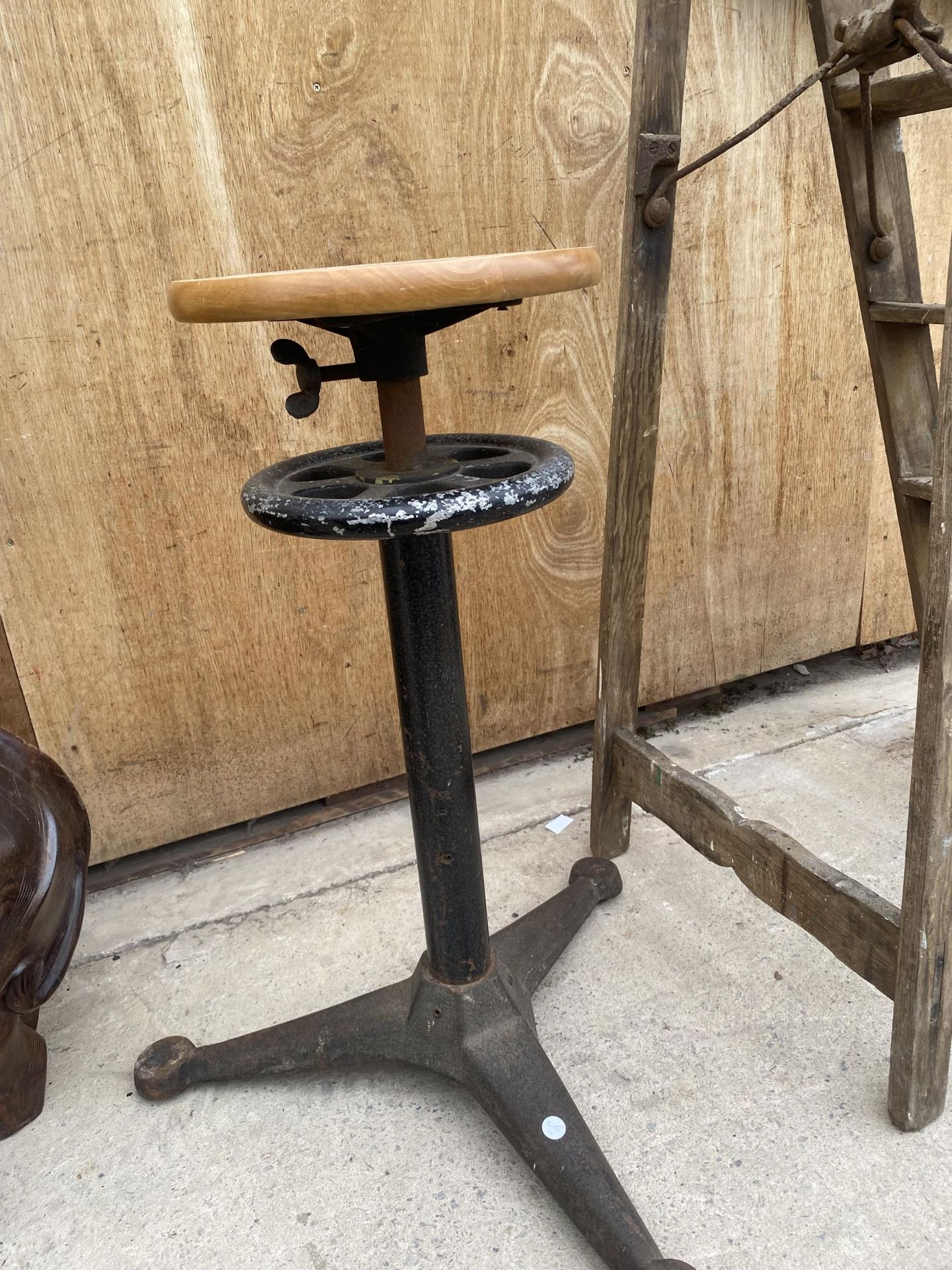 AN INDUSTRIAL ADJUSTABLE STOOL WITH CAST BASE - Image 3 of 3