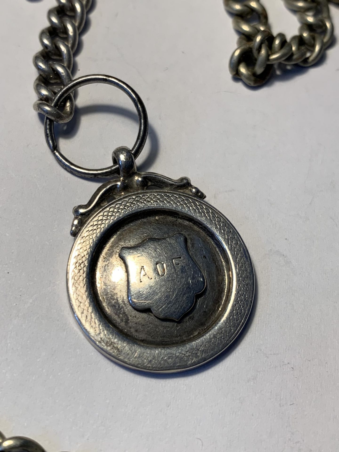 A POCKET WATCH ON A CHAIN WITH A HALLMARKED BIRMINGHAM SILVER FOB - Image 5 of 6