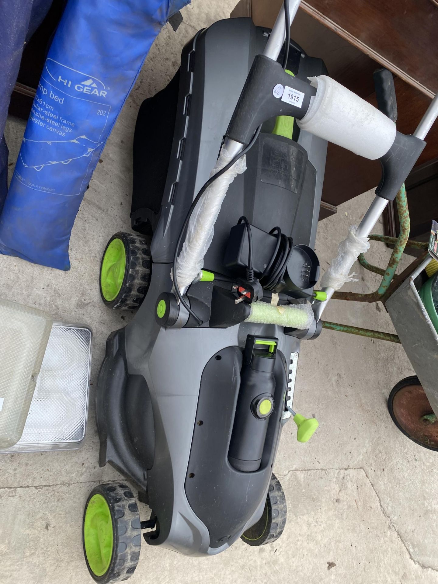 A BATTERY POWERED GTECH LAWN MOWER COMPLETE WITH CHARGER AND GRASS BOX - Image 2 of 3