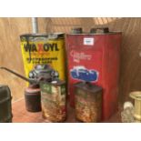 AN ASSORTMENT OF VINTAGE OIL DRUMS AND CANS TO INCLUDE CASTROL AND MILLERS ETC