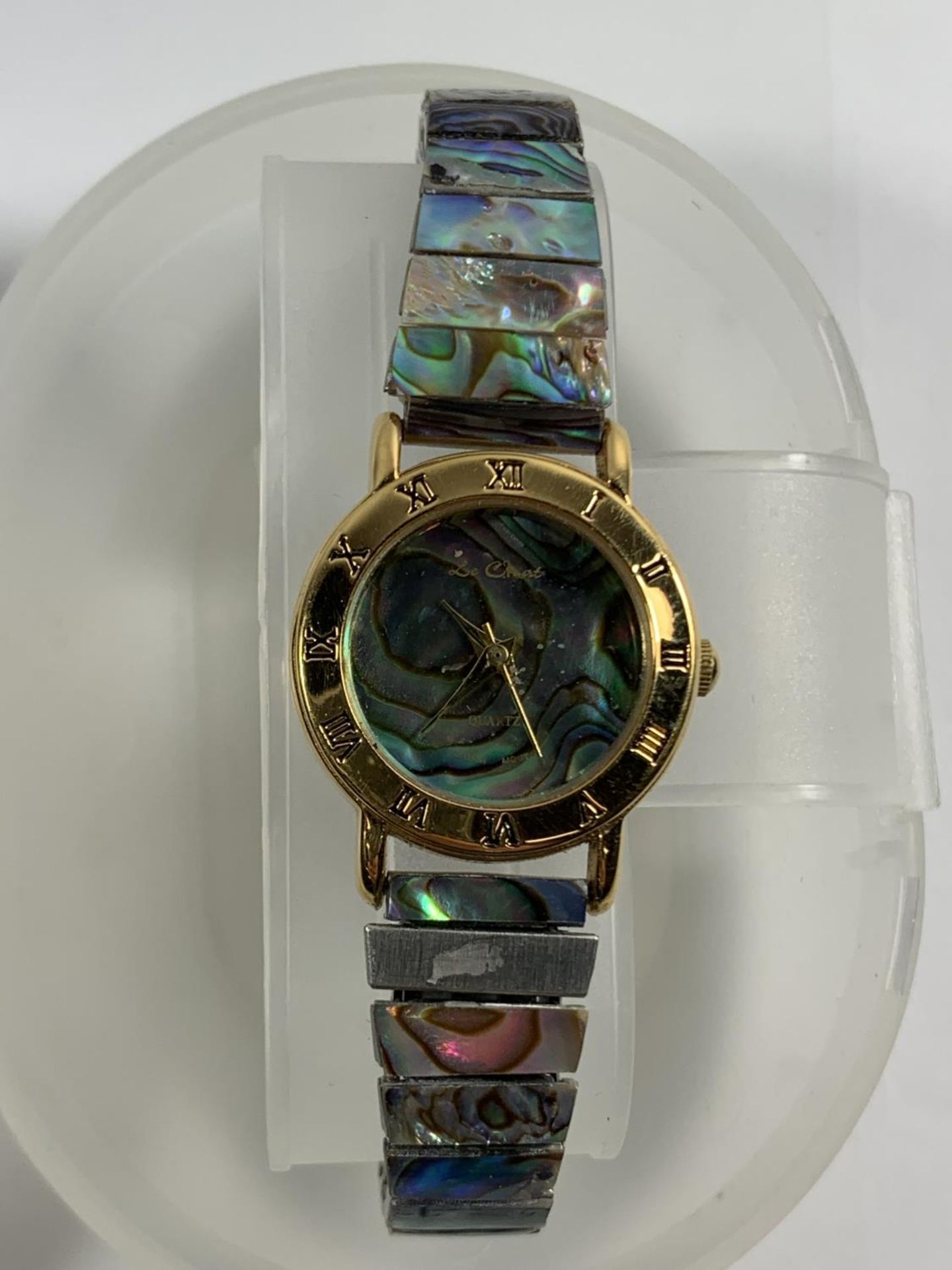 A MOTHER OF PEARL WRIST WATCH IN A PRESNTATION BOX SEEN WORKING BUT NO WARRANTY - Image 2 of 4