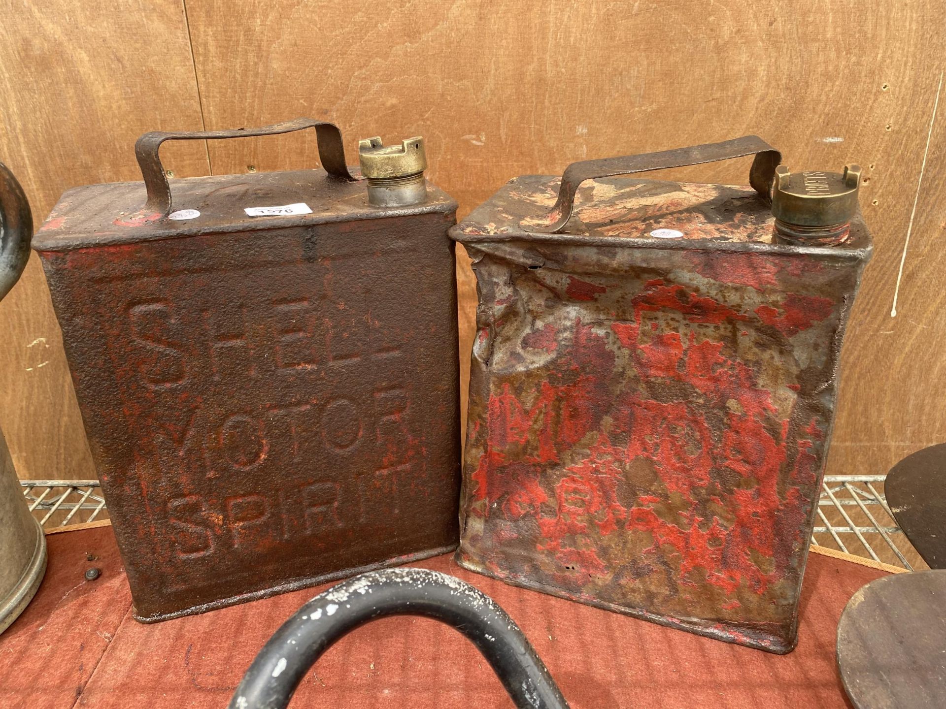 TWO VINTAGE FUEL CANS TO INCLUDE SHELL AND PRATTS BOTH WITH BRASS CAPS