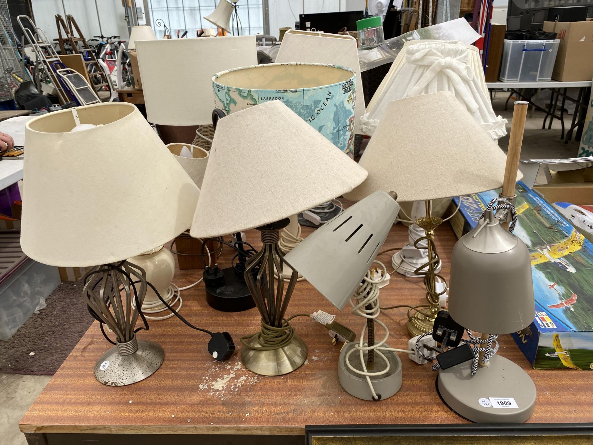 A COLLECTION OF TABLE LAMPS WITH SHADES