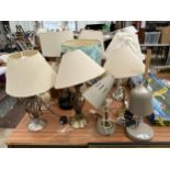 A COLLECTION OF TABLE LAMPS WITH SHADES