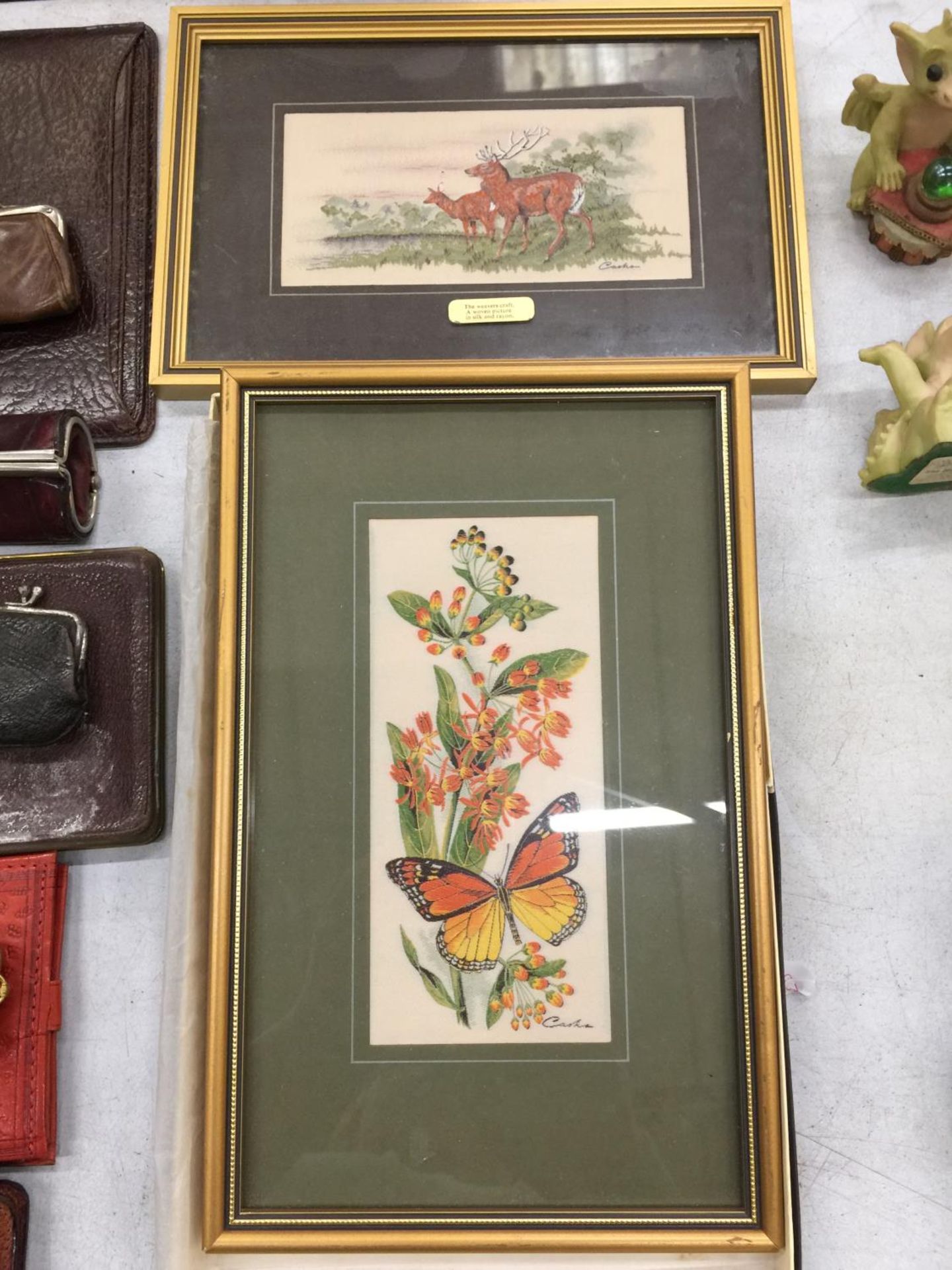 A CASH'S WOVEN PICTURE OF A BUTTERFLY AND RED DEER