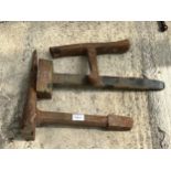 AN ASSORTMENT OF VINTAGE CAST IRON FORGING TOOLS