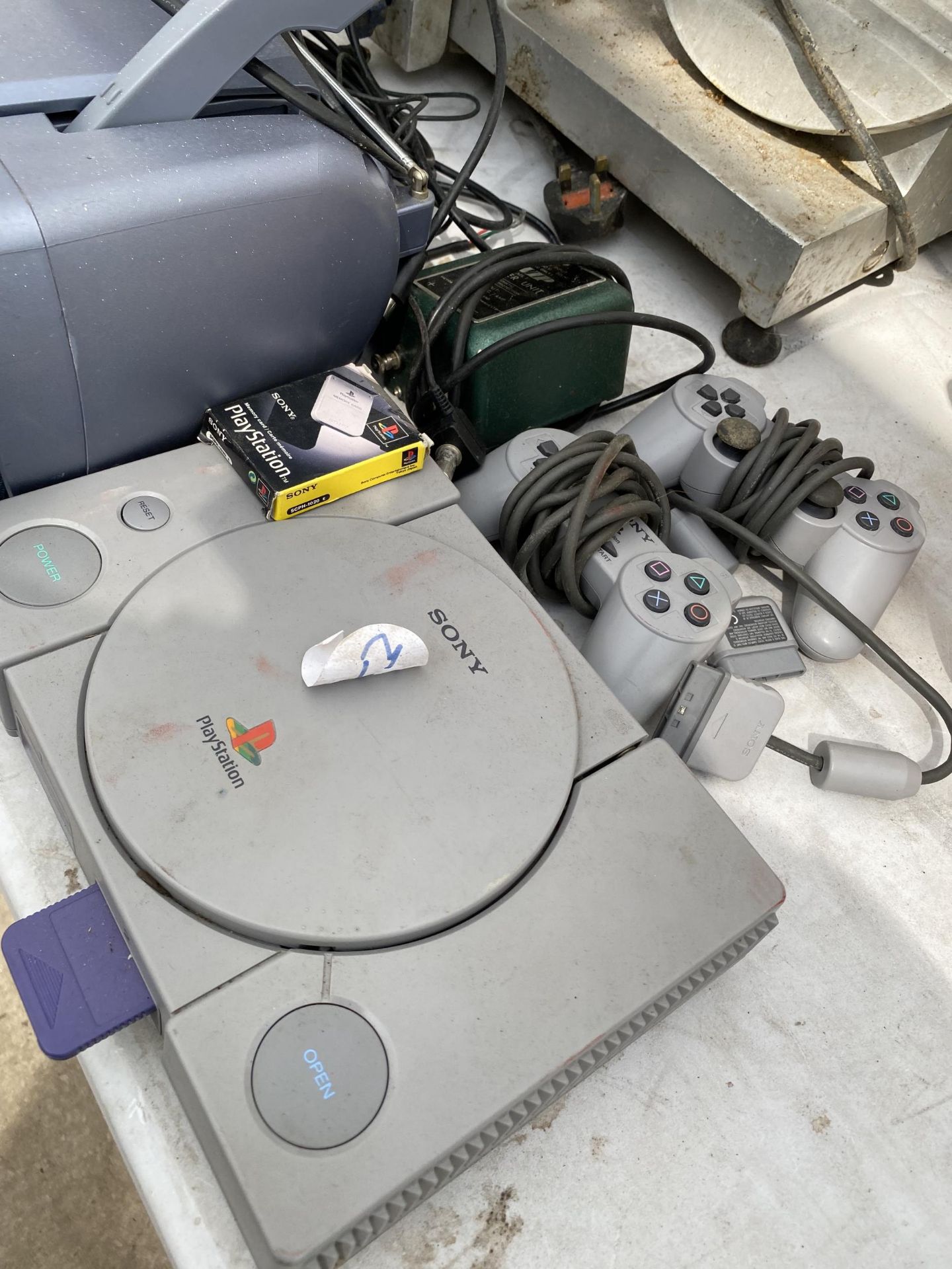 A SONY PLAYSTATION ONE WITH TWO CONTROLLERS AND A SONY RADIO - Image 2 of 3