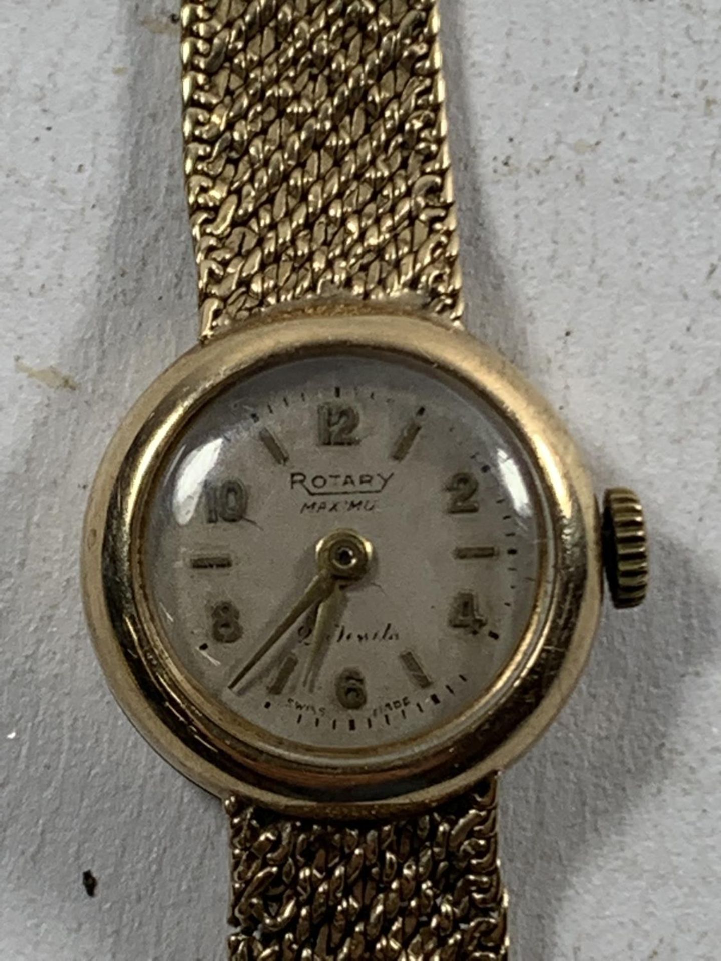 A 9 CARAT GOLD ROTARY WRIST WATCH WITH 9 CARAT GOLD STRAP - WEIGHT EXCLUDING MOVEMENT 19 GRAMS - Image 2 of 3