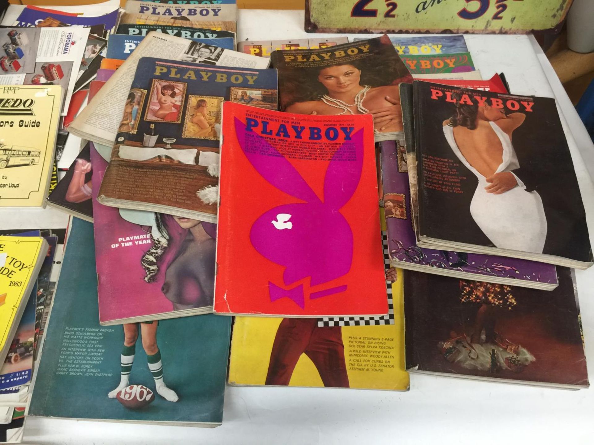 A LARGE QUANTITY OF VINTAGE PLAYBOY MAGAZINES FROM THE 1960'S AND 1970'S