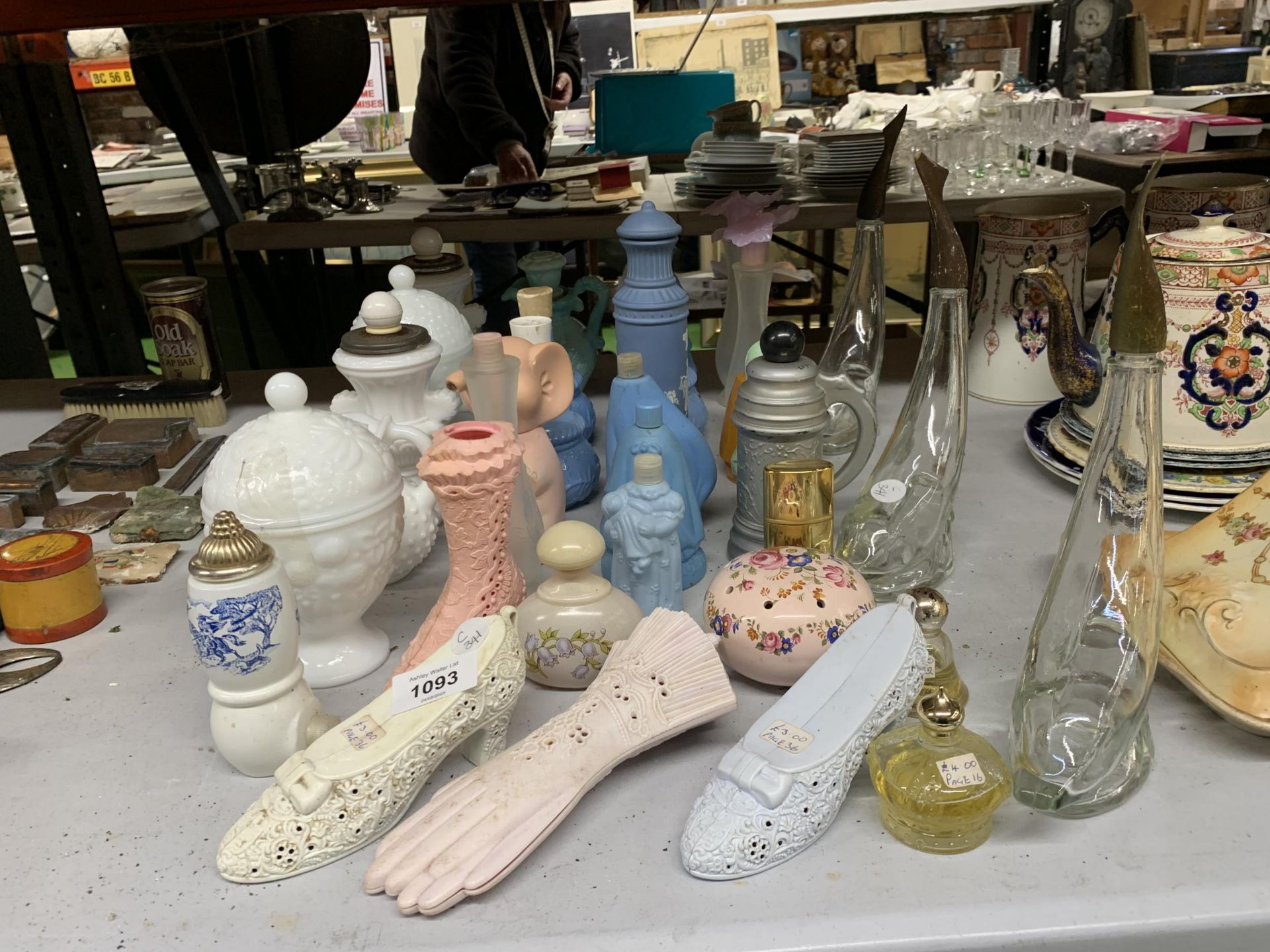 A MIXED GROUP OF VINTAGE ITEMS, WHITE GLASS LIDDED POTS, GLASS DOLPHIN SHAPES BOTTLES ETC