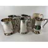 * A COLLECTION OF SIX PRESENTATION MUGS TO INCLUDE SILVER PLATED, THREE PEWTER AND CERAMIC EXAMPLES