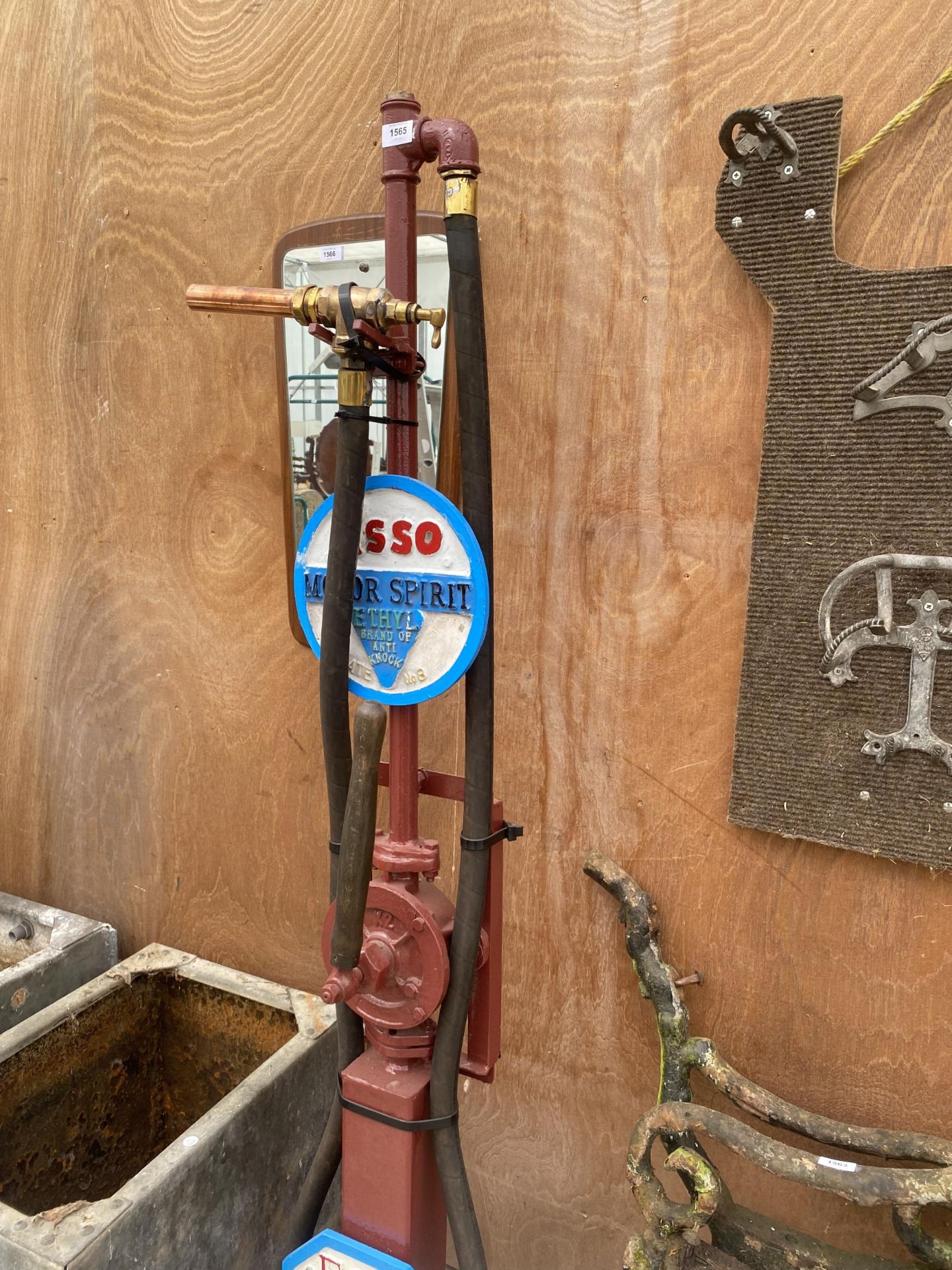 AN 'ESSO' PETROL PUMP WITH BRASS NOZZLE