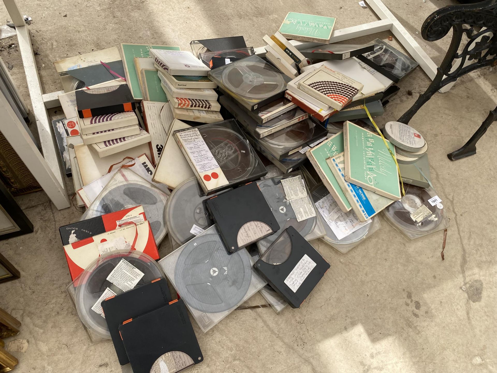 A LARGE COLLECTION OF REEL RECORDING TAPES IN BOXES