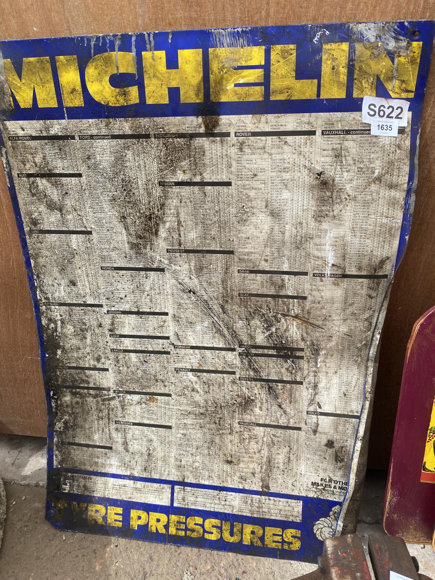 A VINTAGE METAL MICHELIN TYRE PRESSURES SIGN