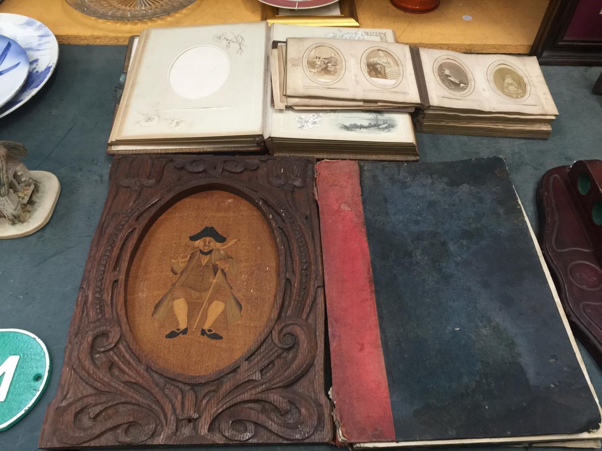 TWO VICTORIAN PHOTO ALBUMS ONE CONTAINING A QUANTITY OF PHOTOGRAPHS, A VINTAGE BOOK 'PLAYERS OF