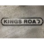 A WOODEN KINGS ROAD STREET SIGN